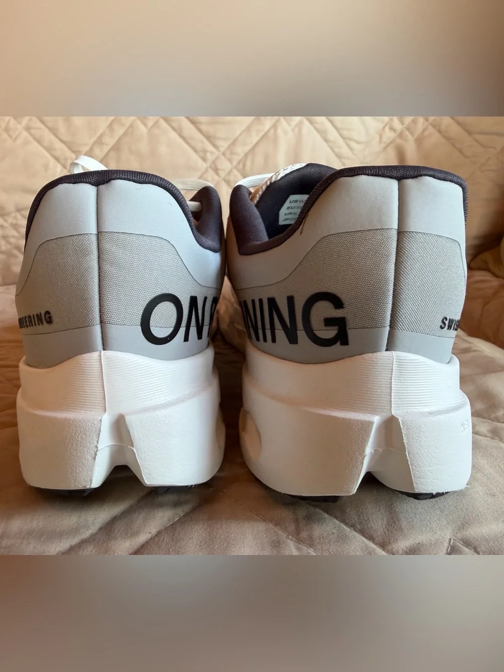 On Running White and Grey Women's Cloudsurfer Next Running Sneakers
